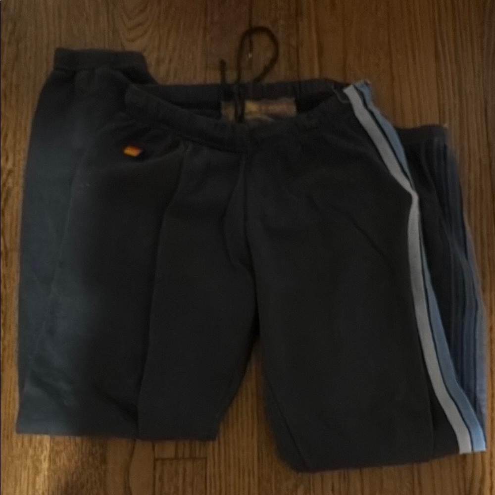 Black sweats with blue stripes!! Great condition no pilling or stains!!